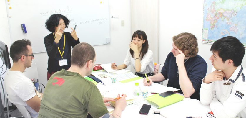 Japanese teacher teaching Japanese to the students