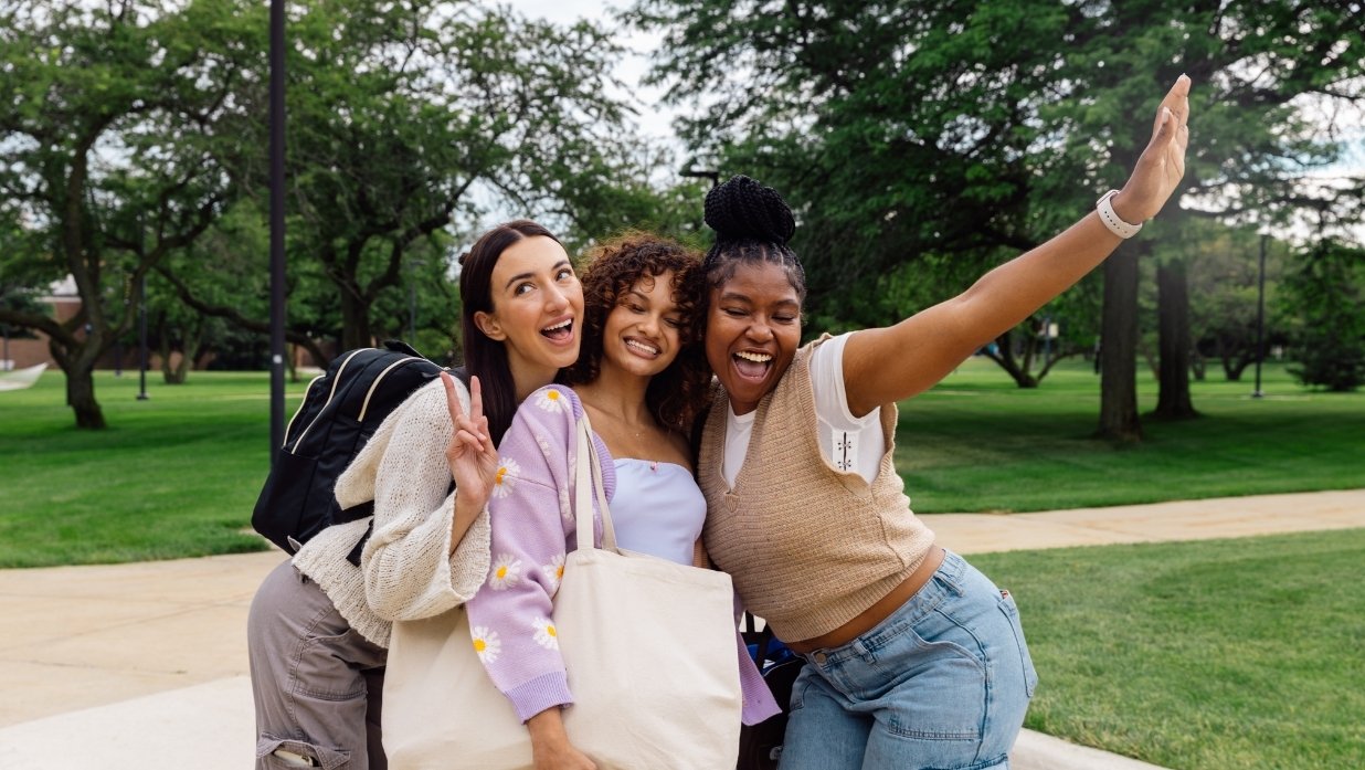 3 girlfriends hanging out and having fun.