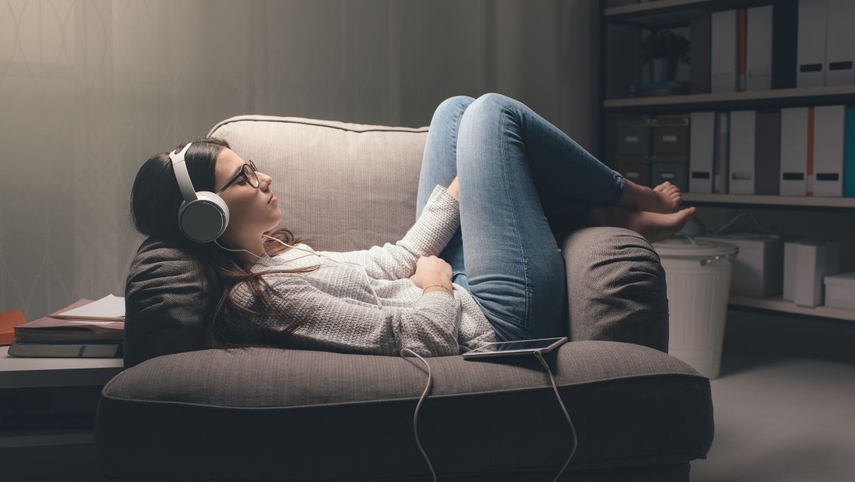 Learning Japanese with J-pop, girl listening to music and relaxing