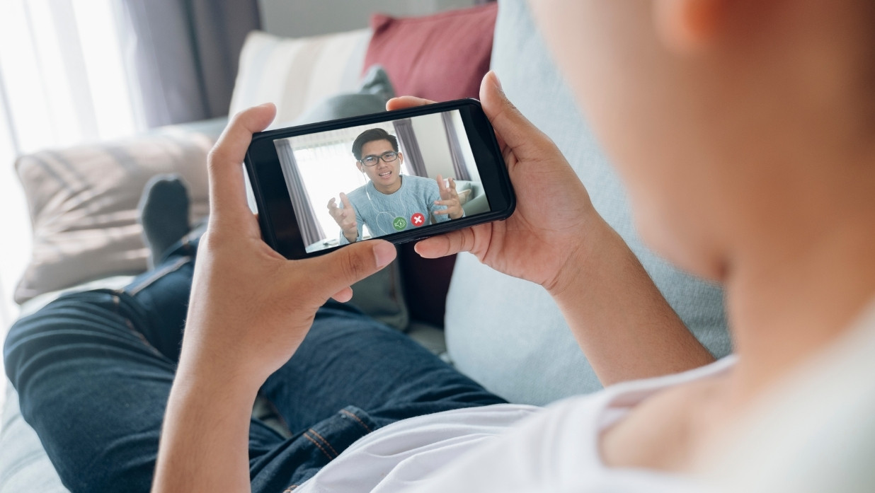 Someone watching a video online.