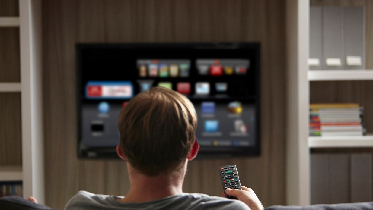 Male about to watch something on his tv. Probably anime