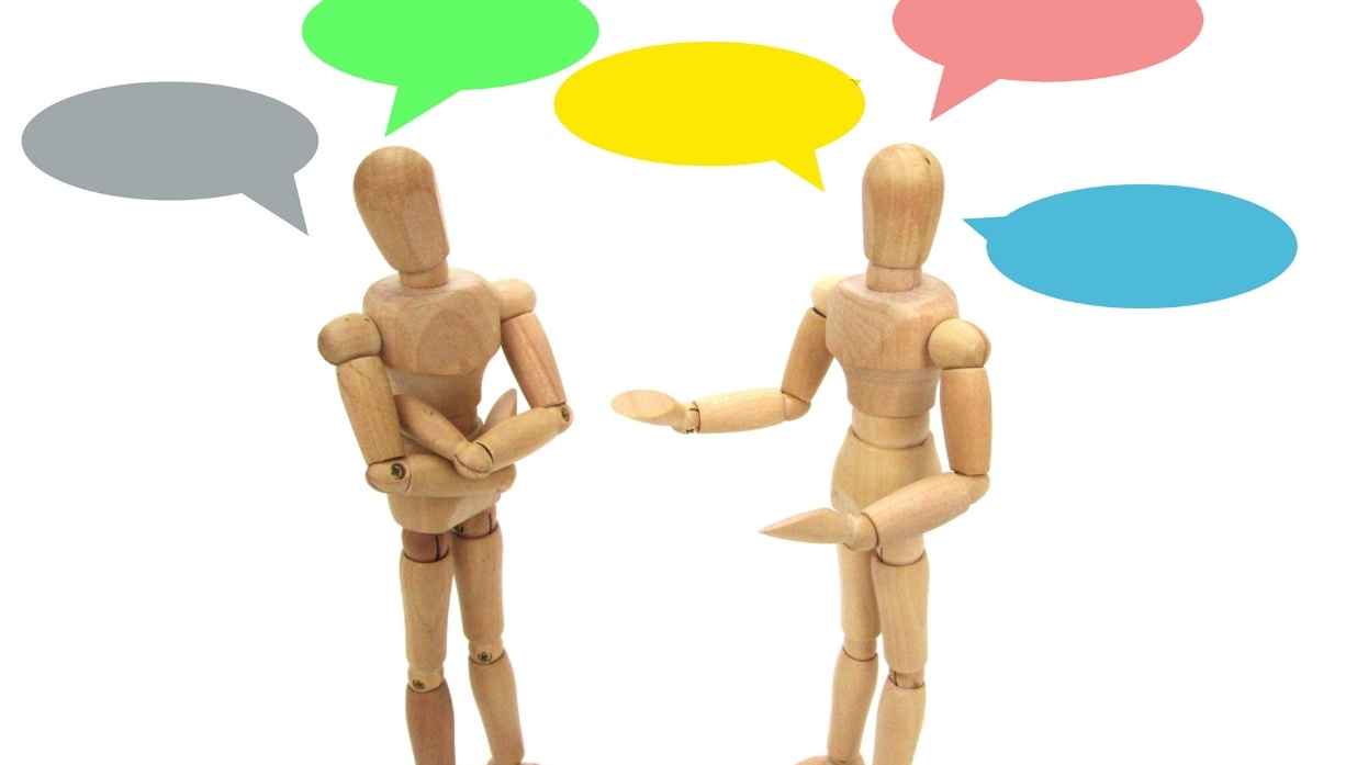 2 inanimate objects talking to each other with speech bubbles surrounding them.