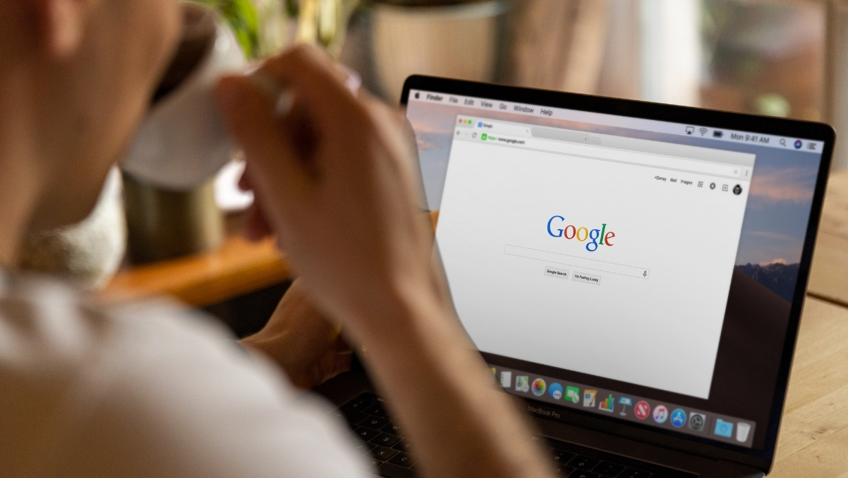 Someone on a laptop looking at Chrome extensions.