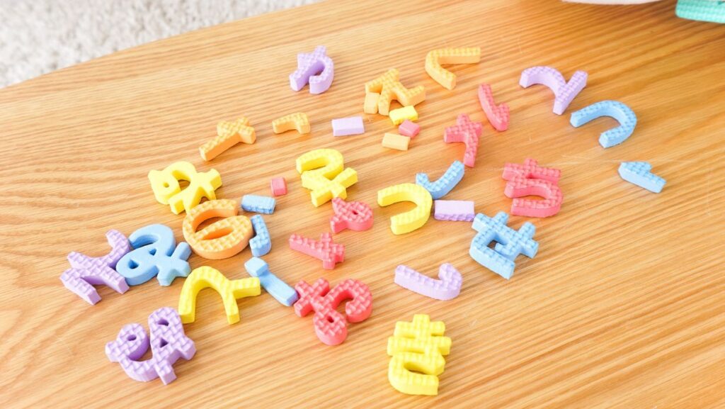 hiragana chart blocks scattered on table