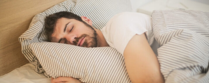 Man sleeping on bed