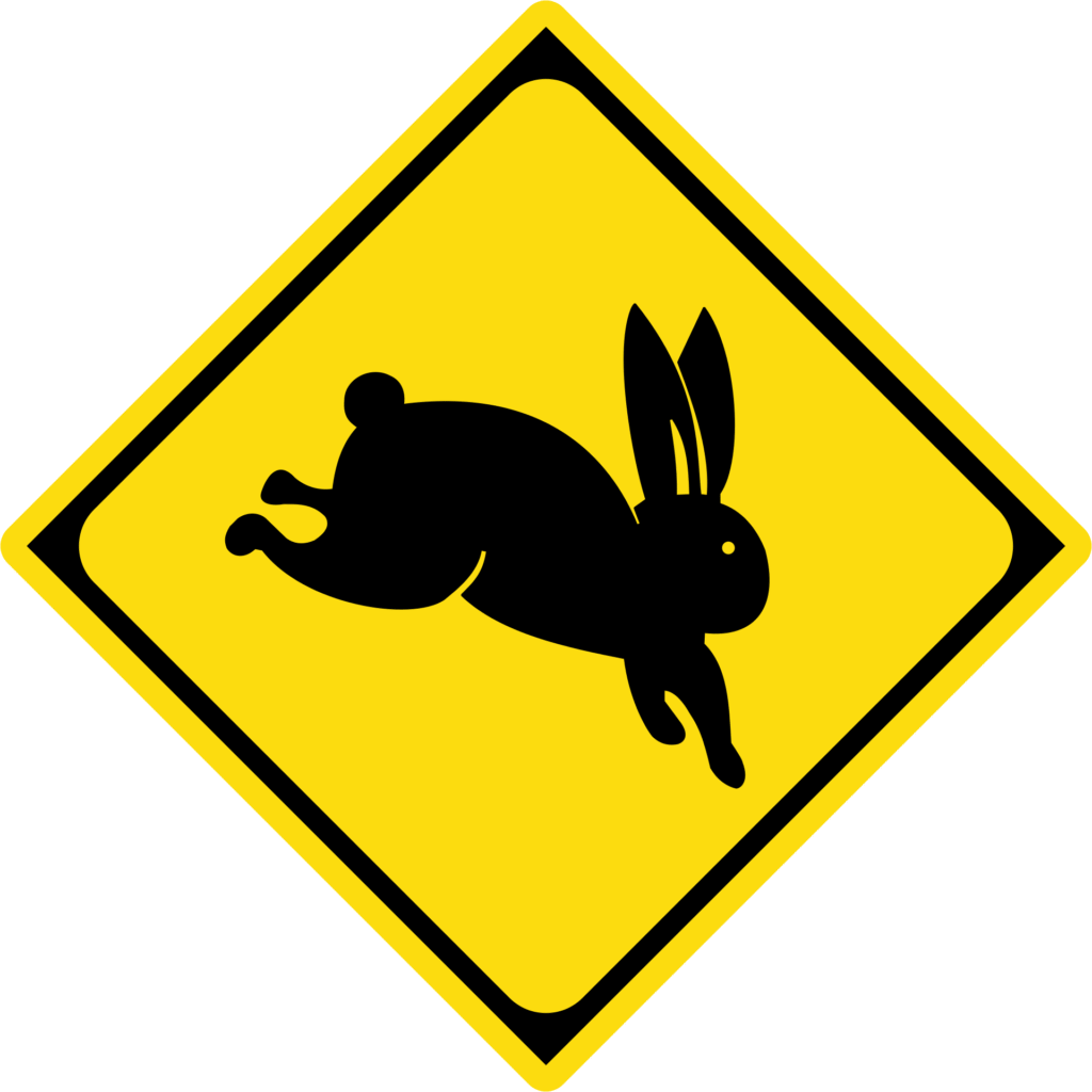 Japanese road sign showing rabbits may be ahead