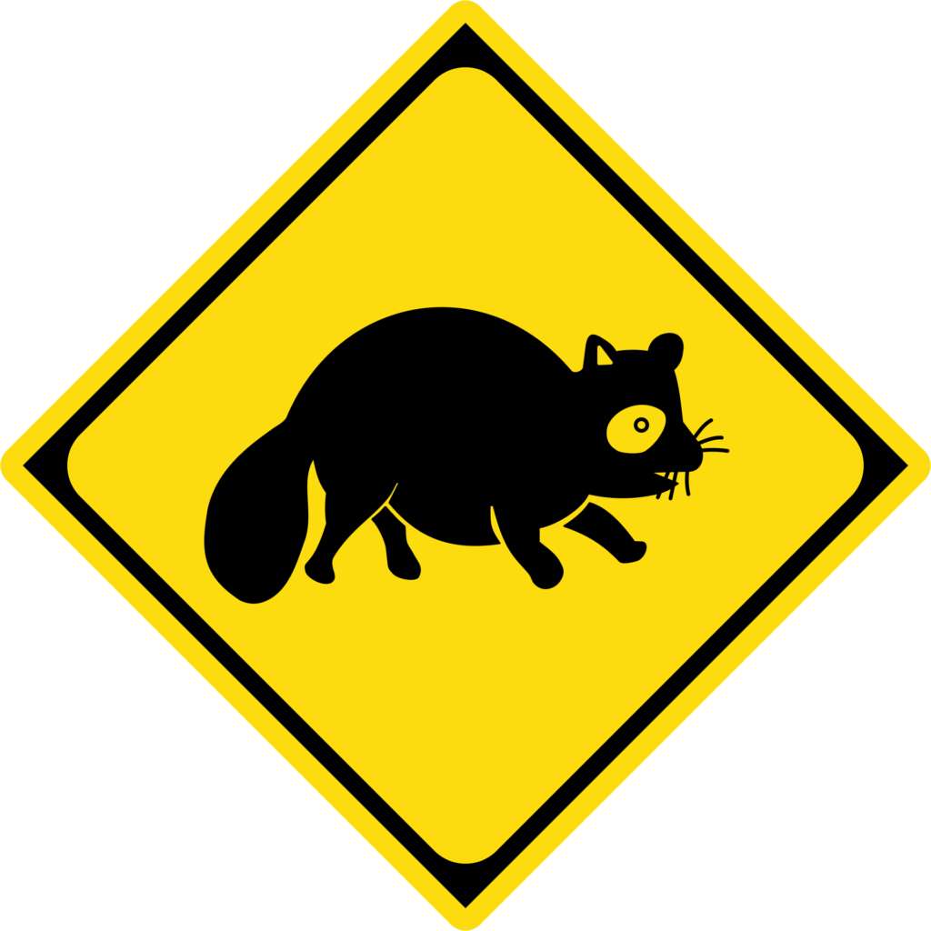 Japanese road sign showing raccoons may be up ahead