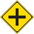 Japanese road sign indicating intersection ahead